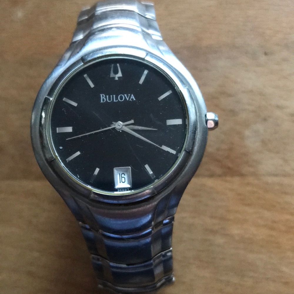 Beautiful Working Bulova black faced Daydate stainless steel watch